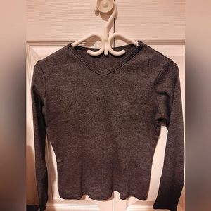 Long sleeved grey v-neck shirt